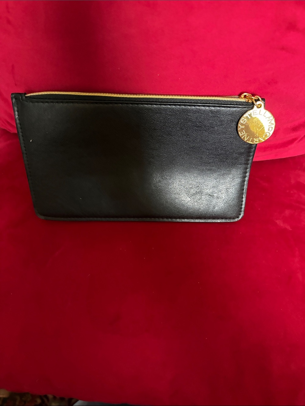 Stella McCartney Black Leather Zip Pouch with Gold Medallion